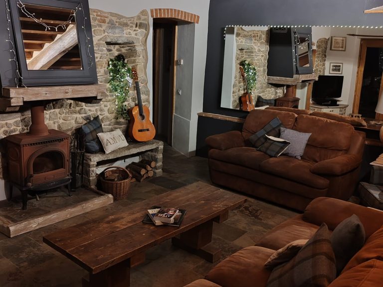 breathe retreat inside living room beams stove
