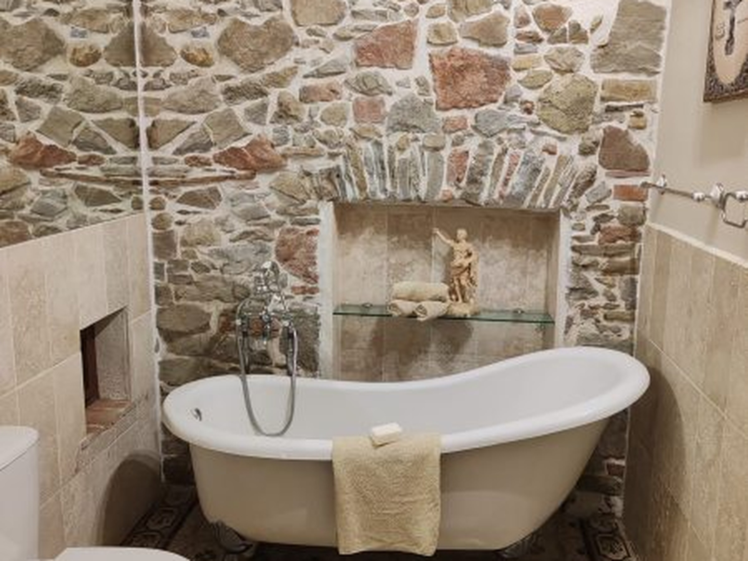 Gallery Stone bathroom with tub