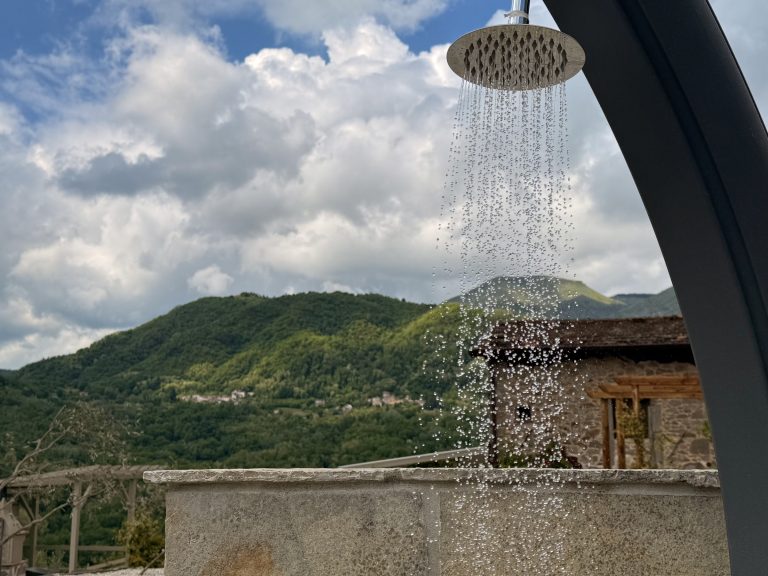 breathe retreat outside shower mountain view